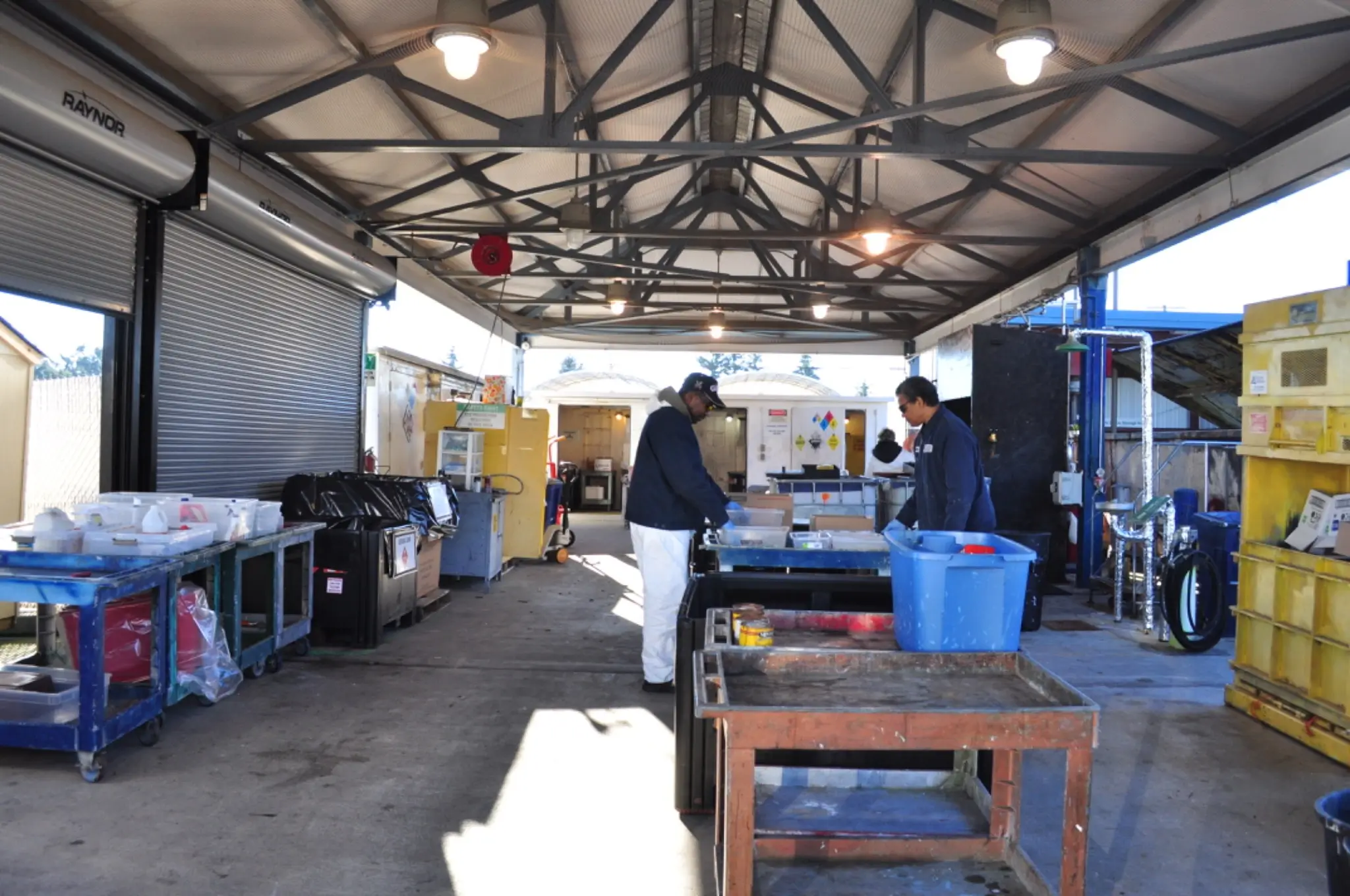 A drop-off center for a household hazardous waste collection event. These items can quickly increase your junk removal costs in Oregon