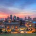 A view of the Kansas City skyline in the evening, serving as an introduction to our guide to junk removal costs in Kansas.