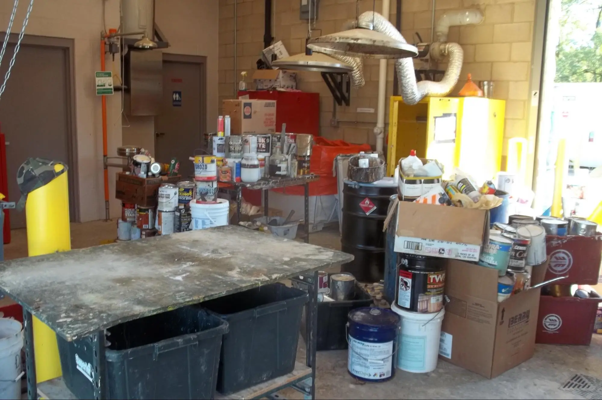 A collection of hazardous waste items at a Household Hazardous Waste collection site. These sorts of items can be tricky to dispose of - even the best junk removal companies may refuse to take them.