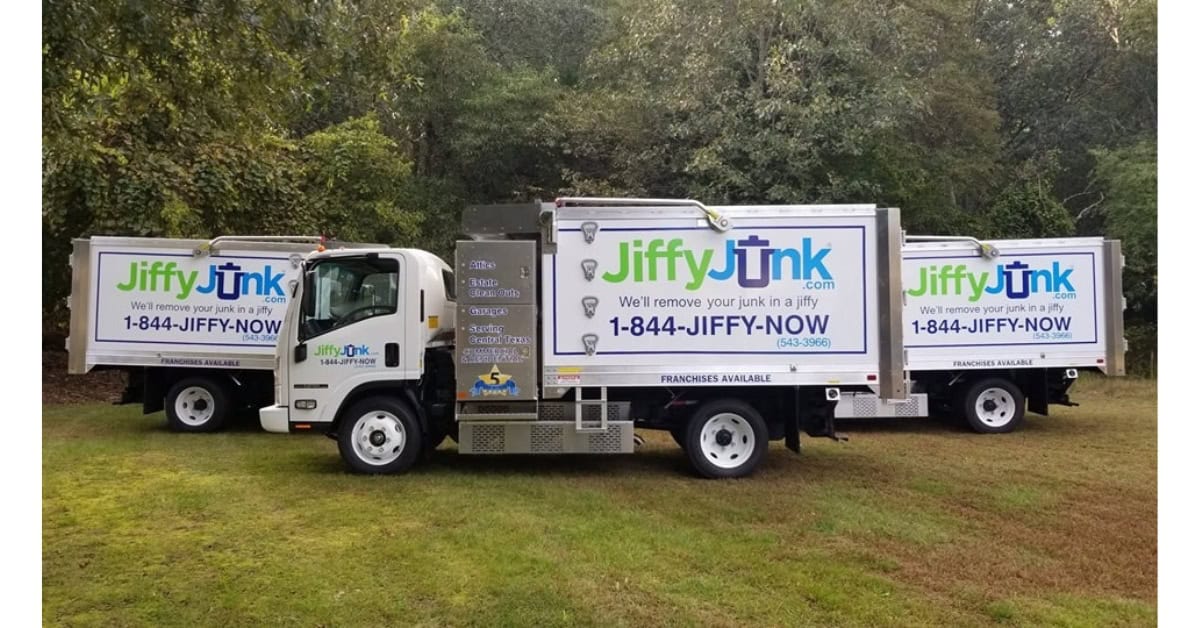 A selection of Jiffy Junk removal trucks.