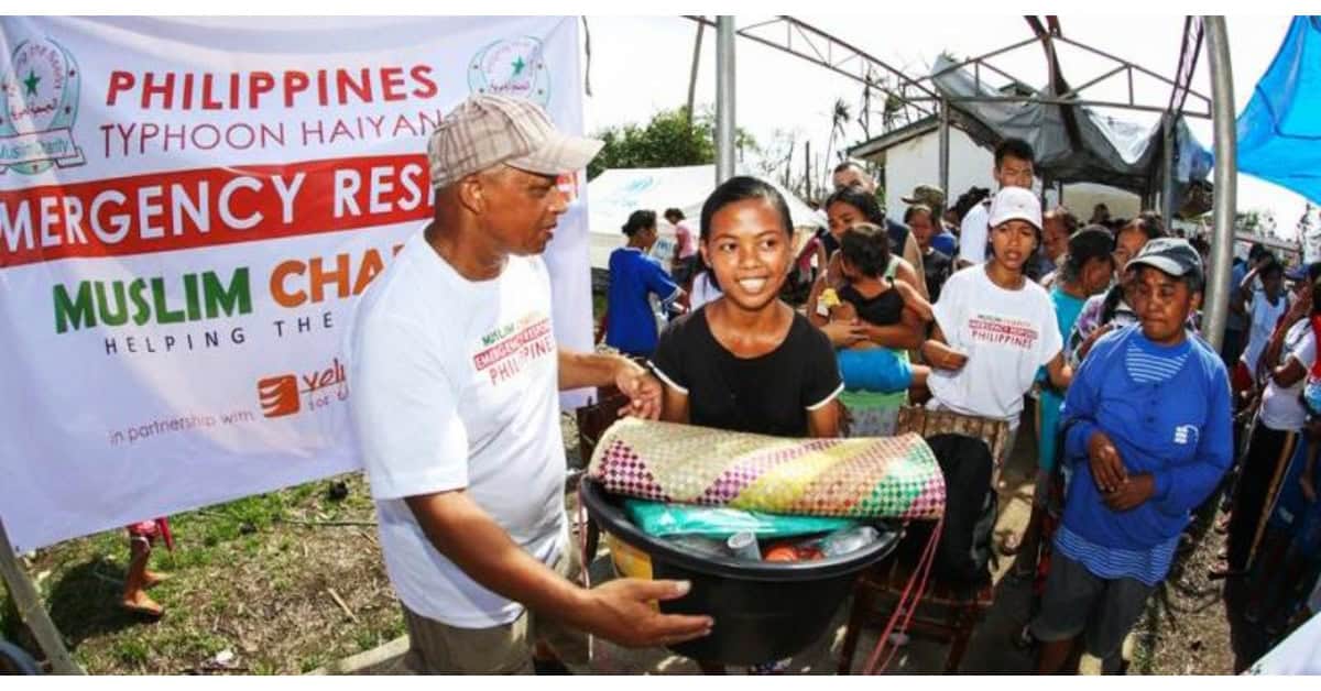 People donating food during a local emergency.