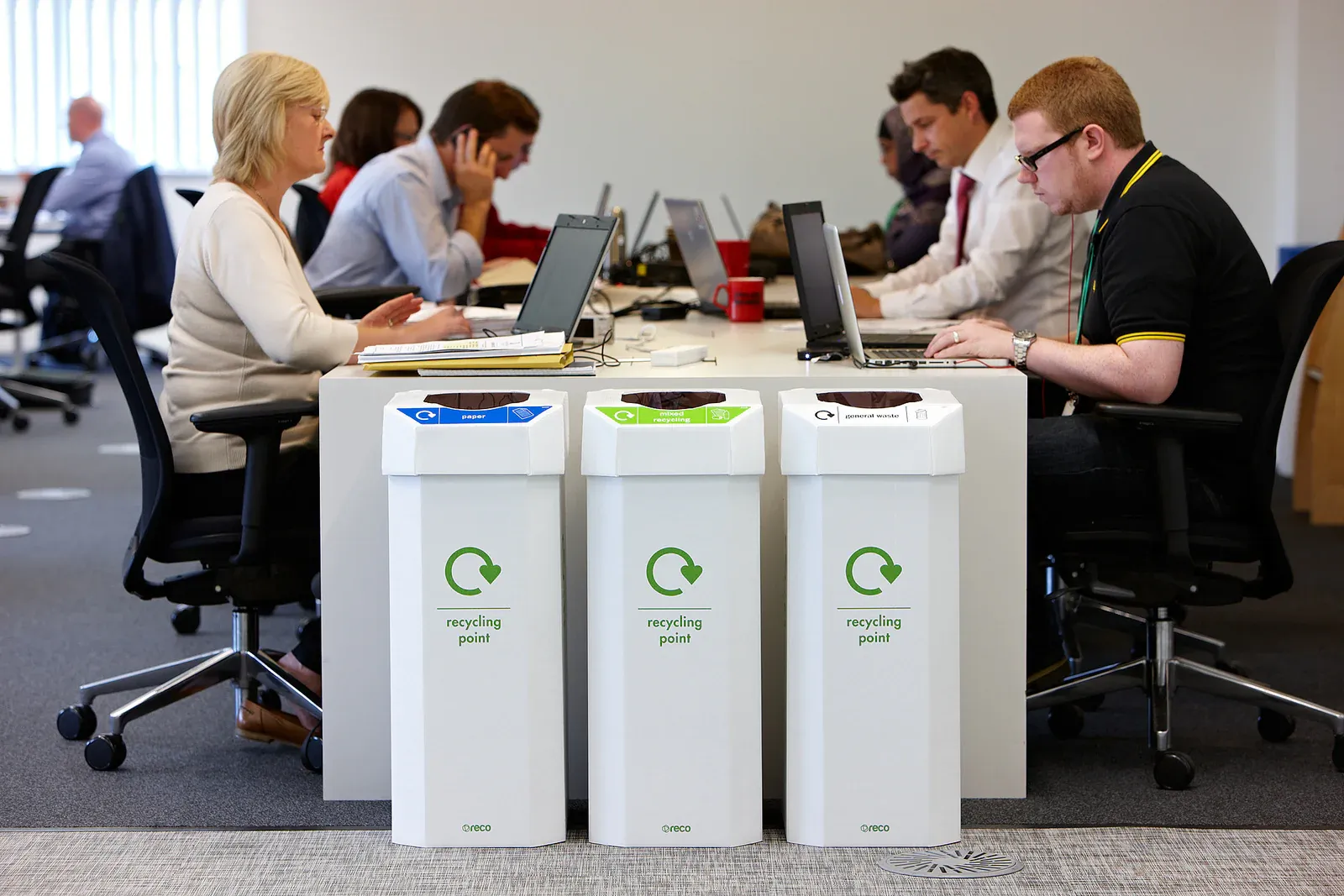  Image showing office recycling bins for different materials. 