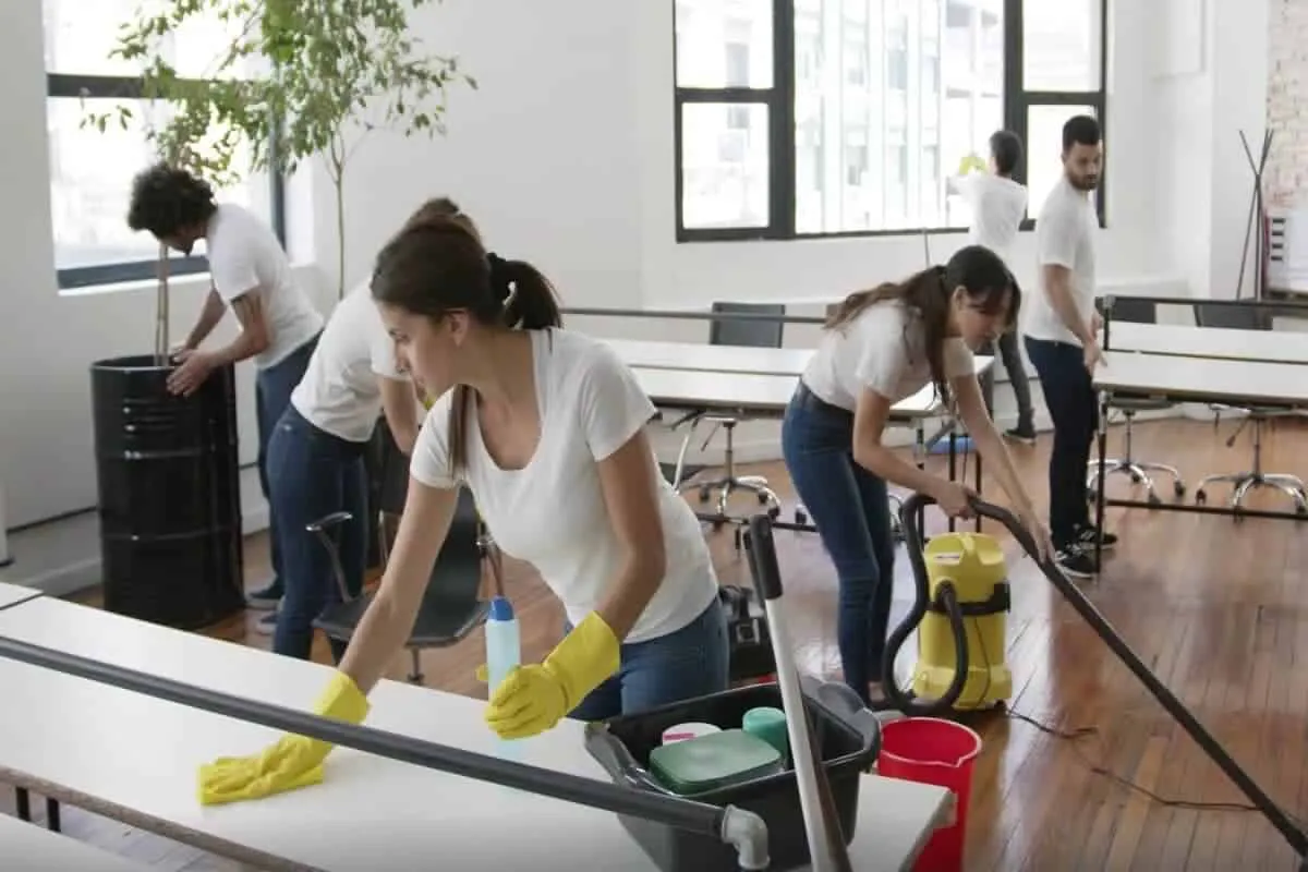 Image showing an office clean up team in action.  