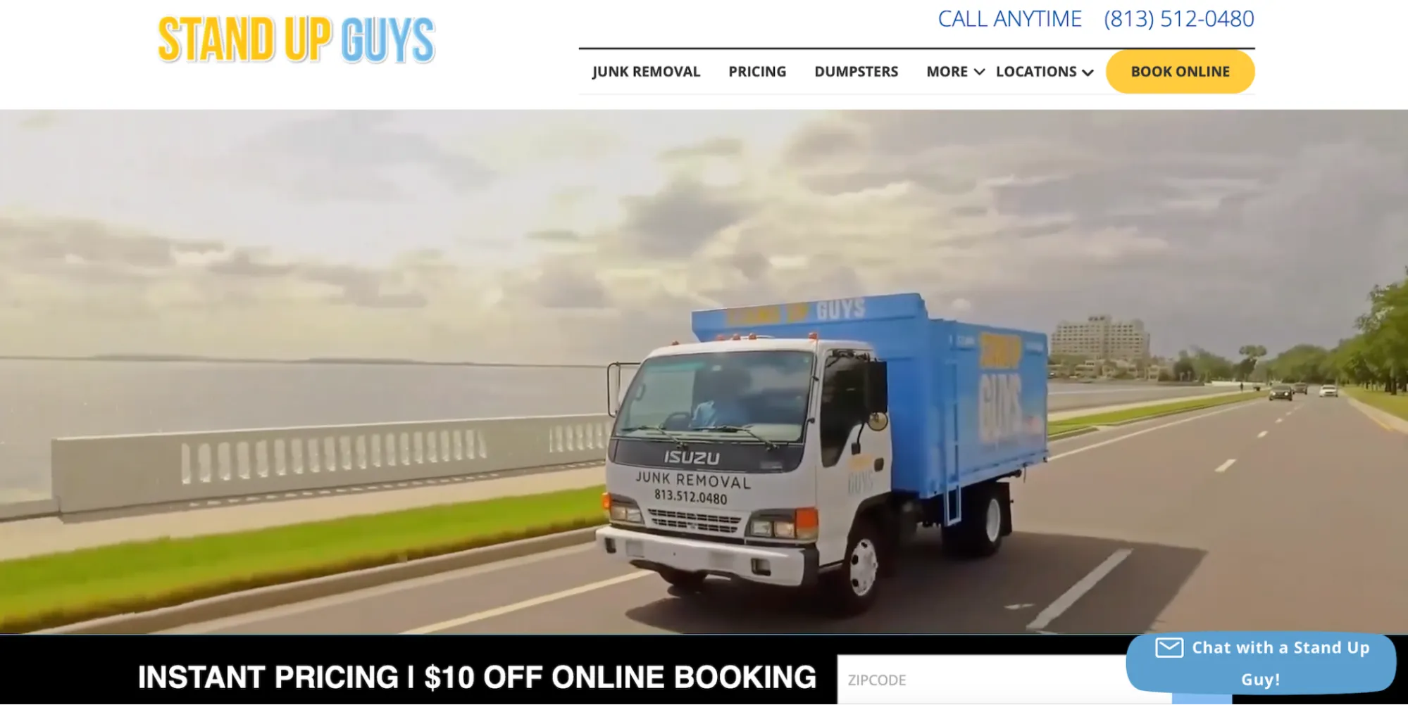 Stand Up Guys Junk Removal homepage showing one of its trucks. 