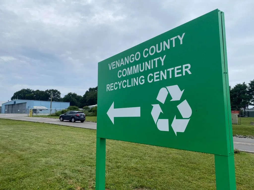 An image showing a sign to a local recycling center. 